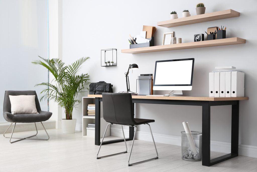 Home office interior of desk, chair and office furniture.